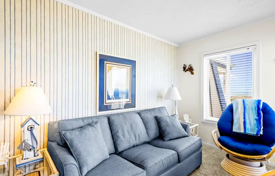 Ocean-view condo with beach access, pool, sports courts, & private balcony