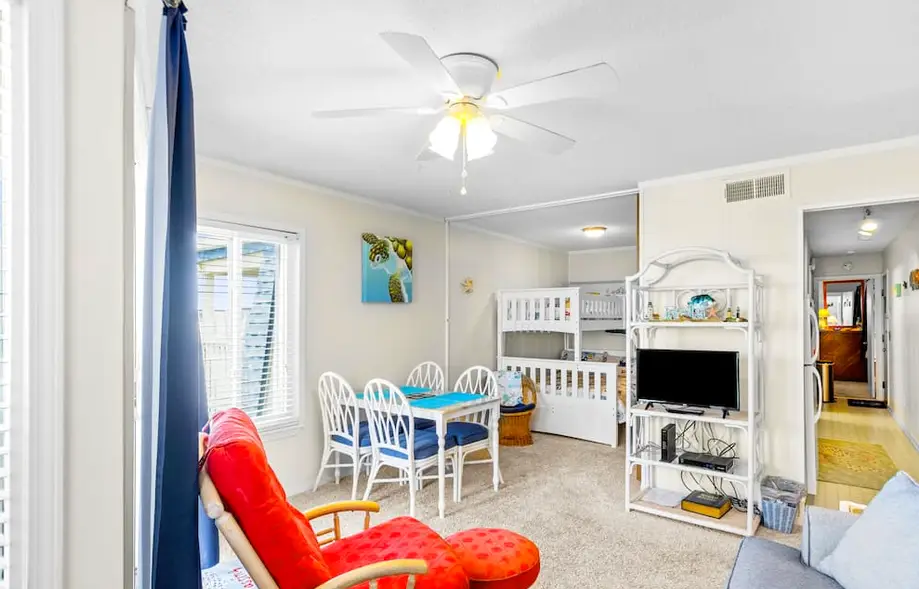 Ocean-view condo with beach access, pool, sports courts, & private balcony