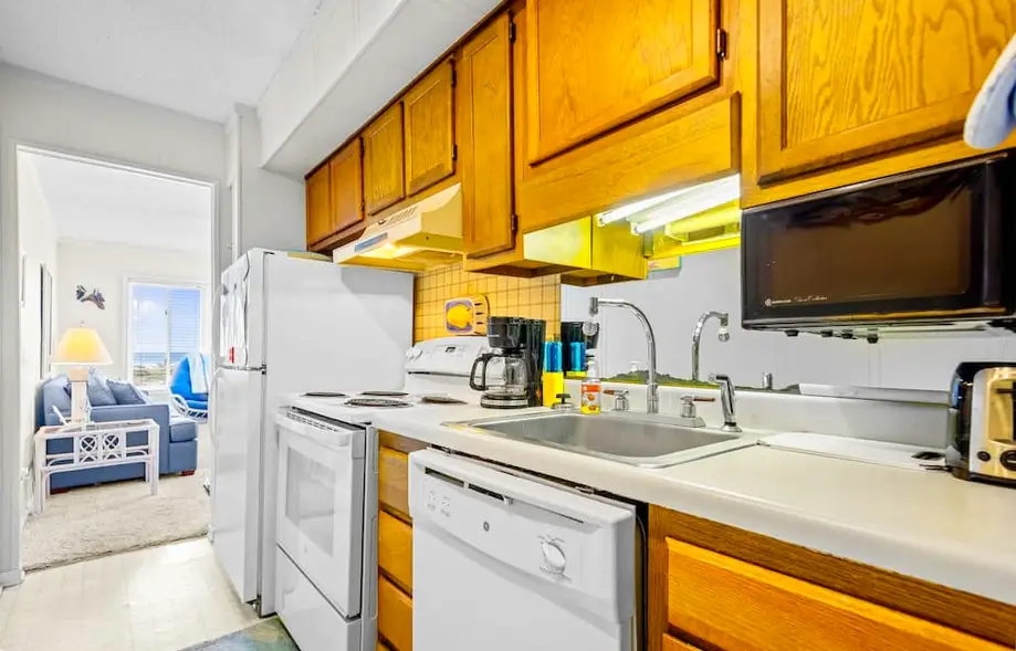 Ocean-view condo with beach access, pool, sports courts, & private balcony