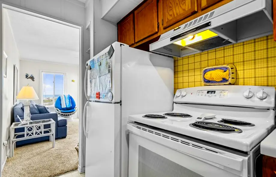 Ocean-view condo with beach access, pool, sports courts, & private balcony